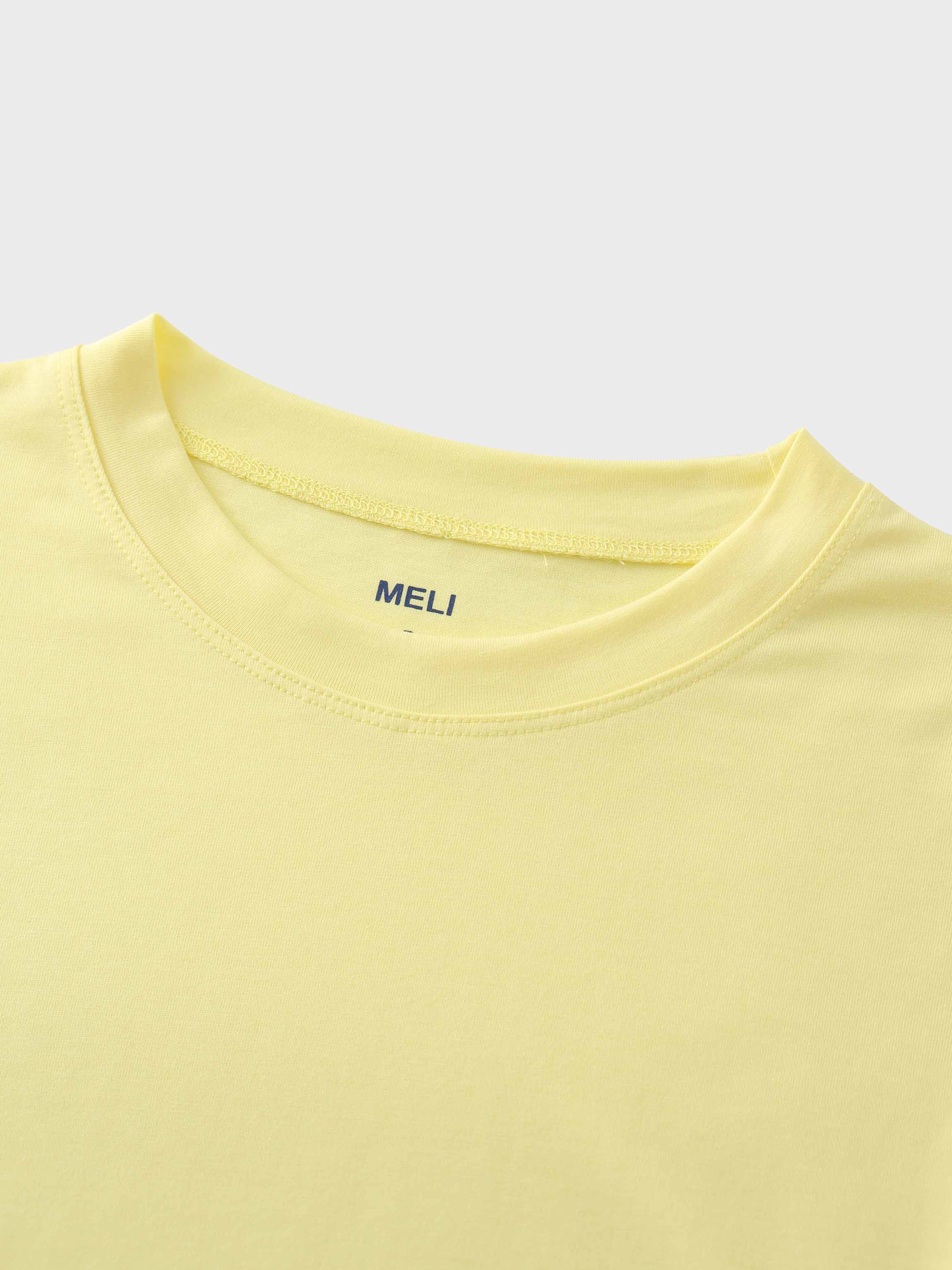 A close-up of the crewneck collar of the pale yellow t-shirt. On the inside, the brand name "MELI" is printed directly onto the fabric in blue.