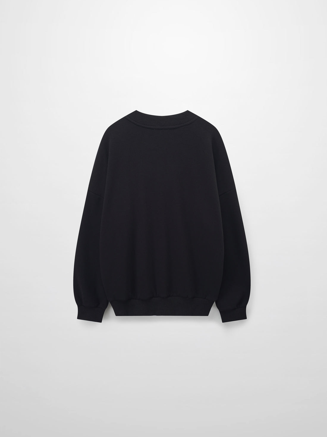 A full, back view of the black sweatshirt. The image shows the plain back of the garment, with its ribbed crewneck collar, sleeve cuffs, and bottom hem all visible.