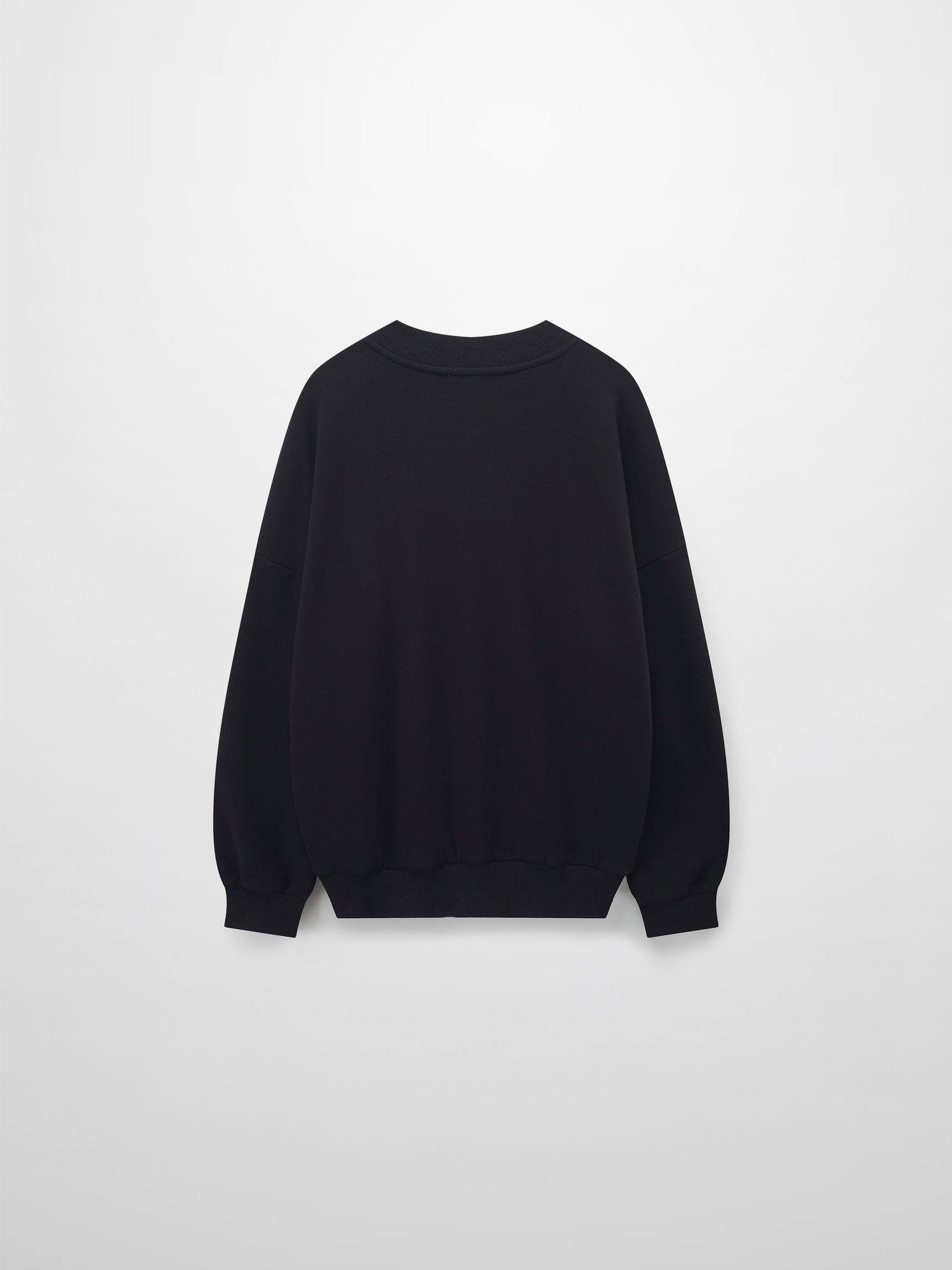 A full, back view of the black sweatshirt. The image shows the plain back of the garment, with its ribbed crewneck collar, sleeve cuffs, and bottom hem all visible.