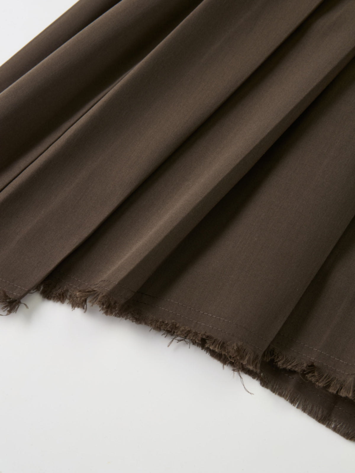 Curved Yoke Fringe Bottom Pleat Skirt SHORT- Brown