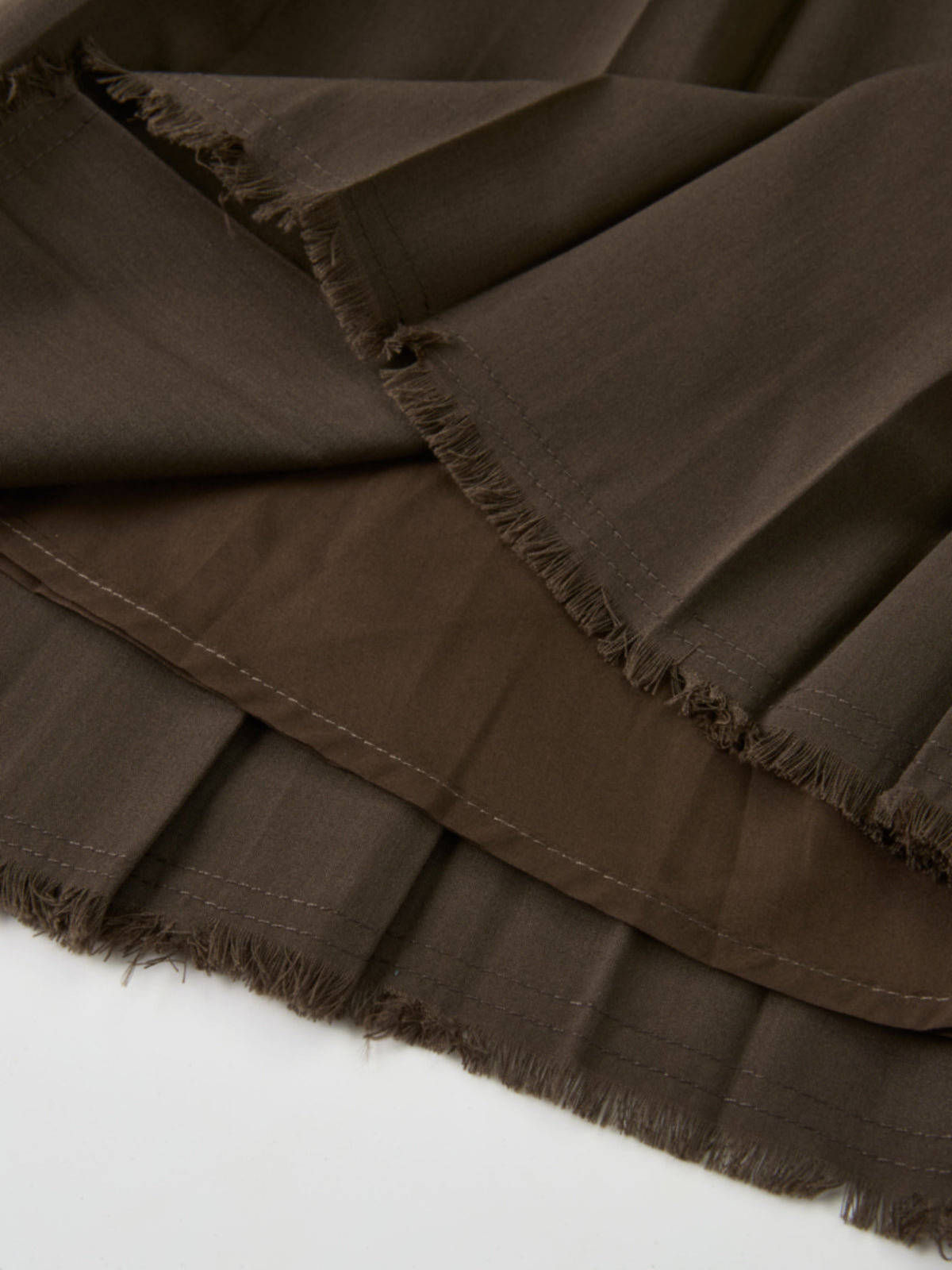 Curved Yoke Fringe Bottom Pleat Skirt SHORT- Brown