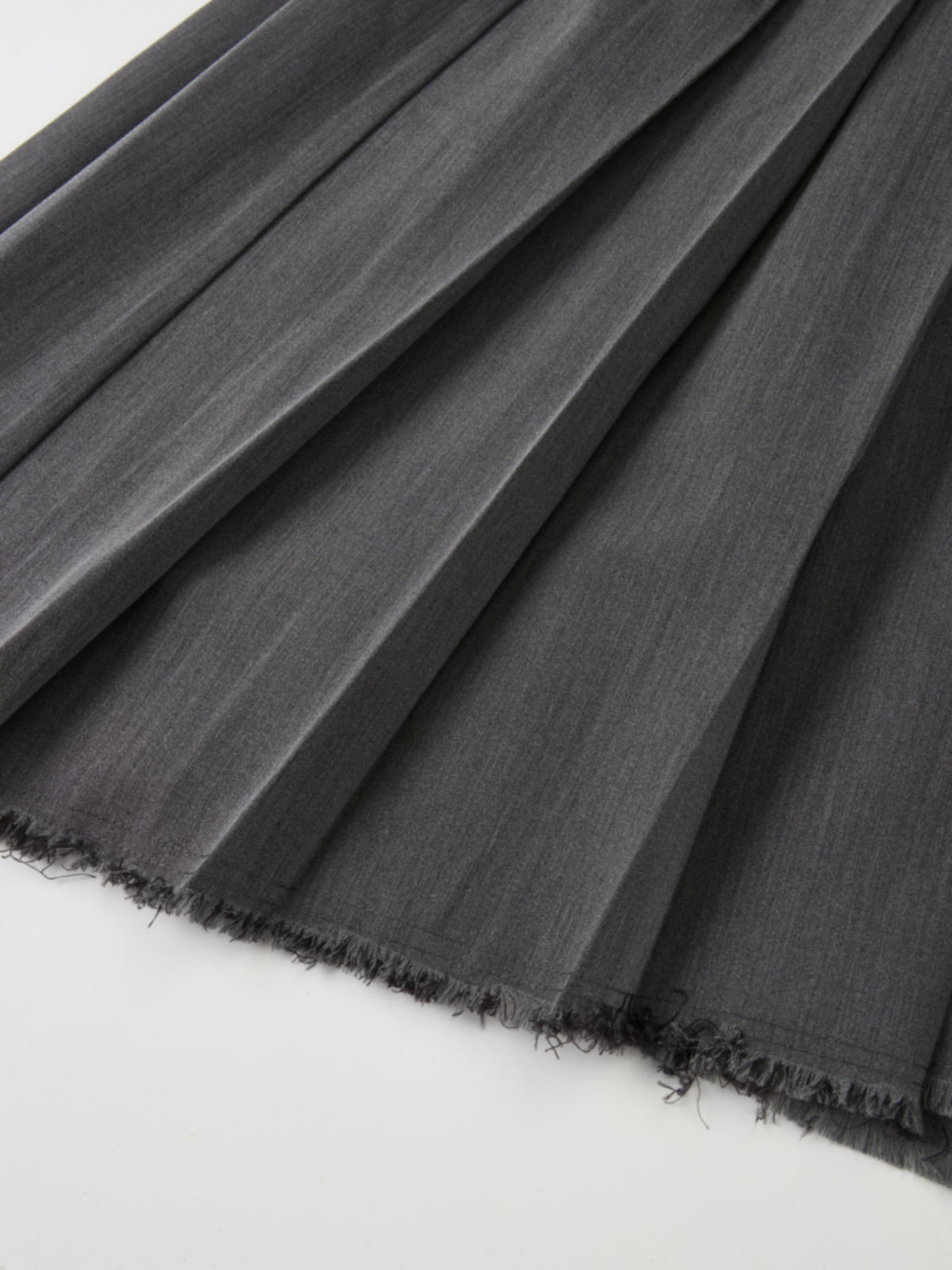 Curved Yoke Fringe Bottom Pleat Skirt SHORT- Grey