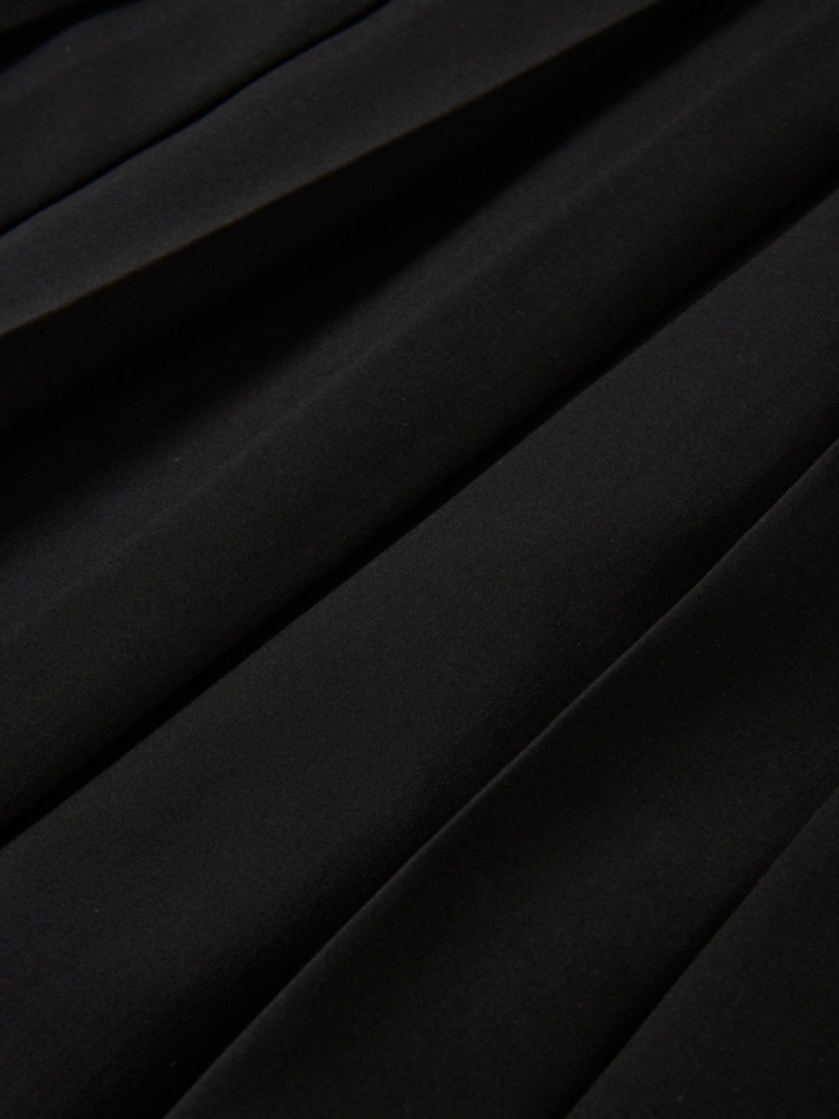 Curved Yoke Fringe Bottom Pleat Skirt SHORT - Black