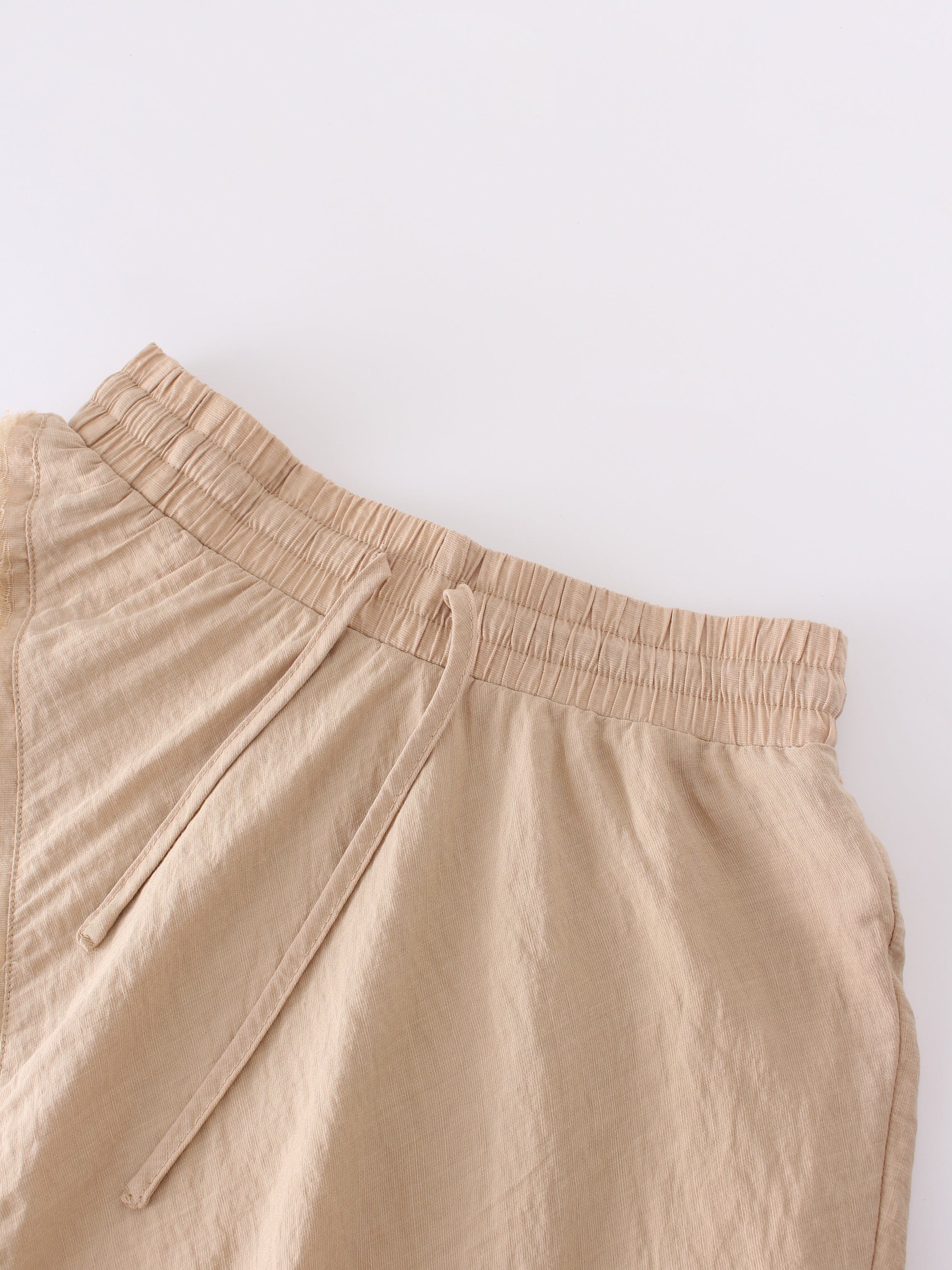 DRAWSTRING FRINGE SKIRT-TAN