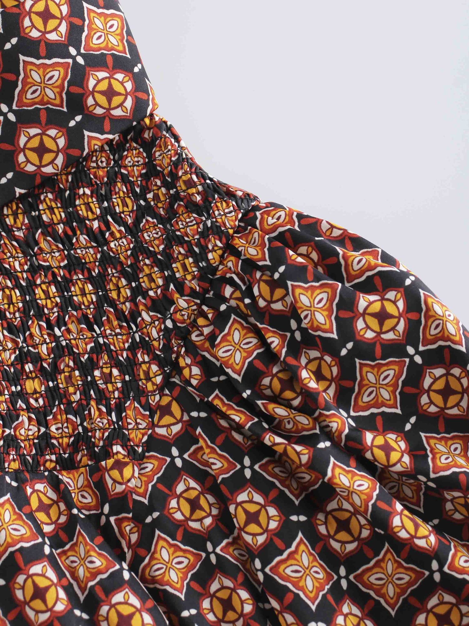 SMOCKED BLOUSE-GEOMETRIC MEDALLION BROWN