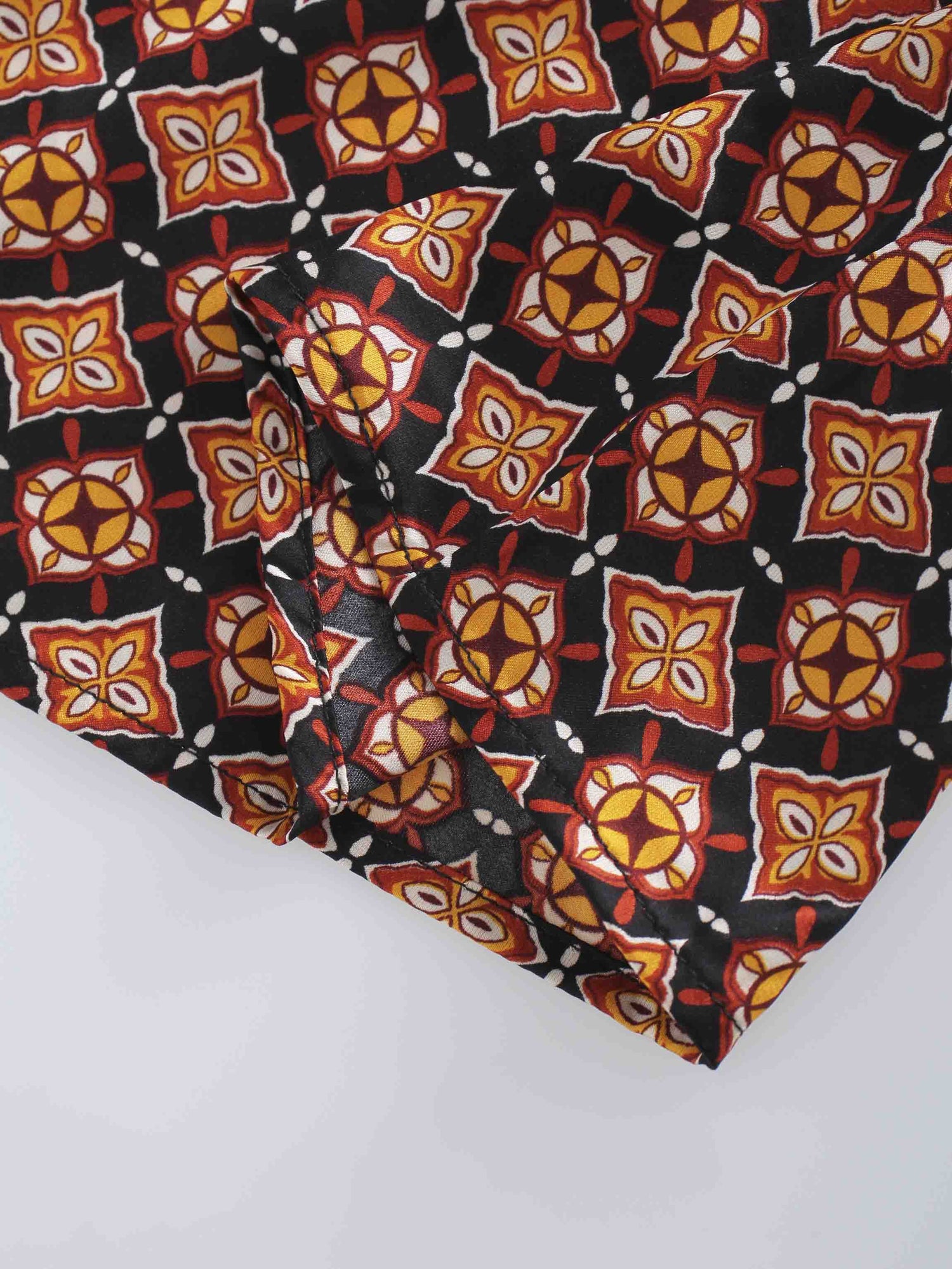 SMOCKED BLOUSE-GEOMETRIC MEDALLION BROWN