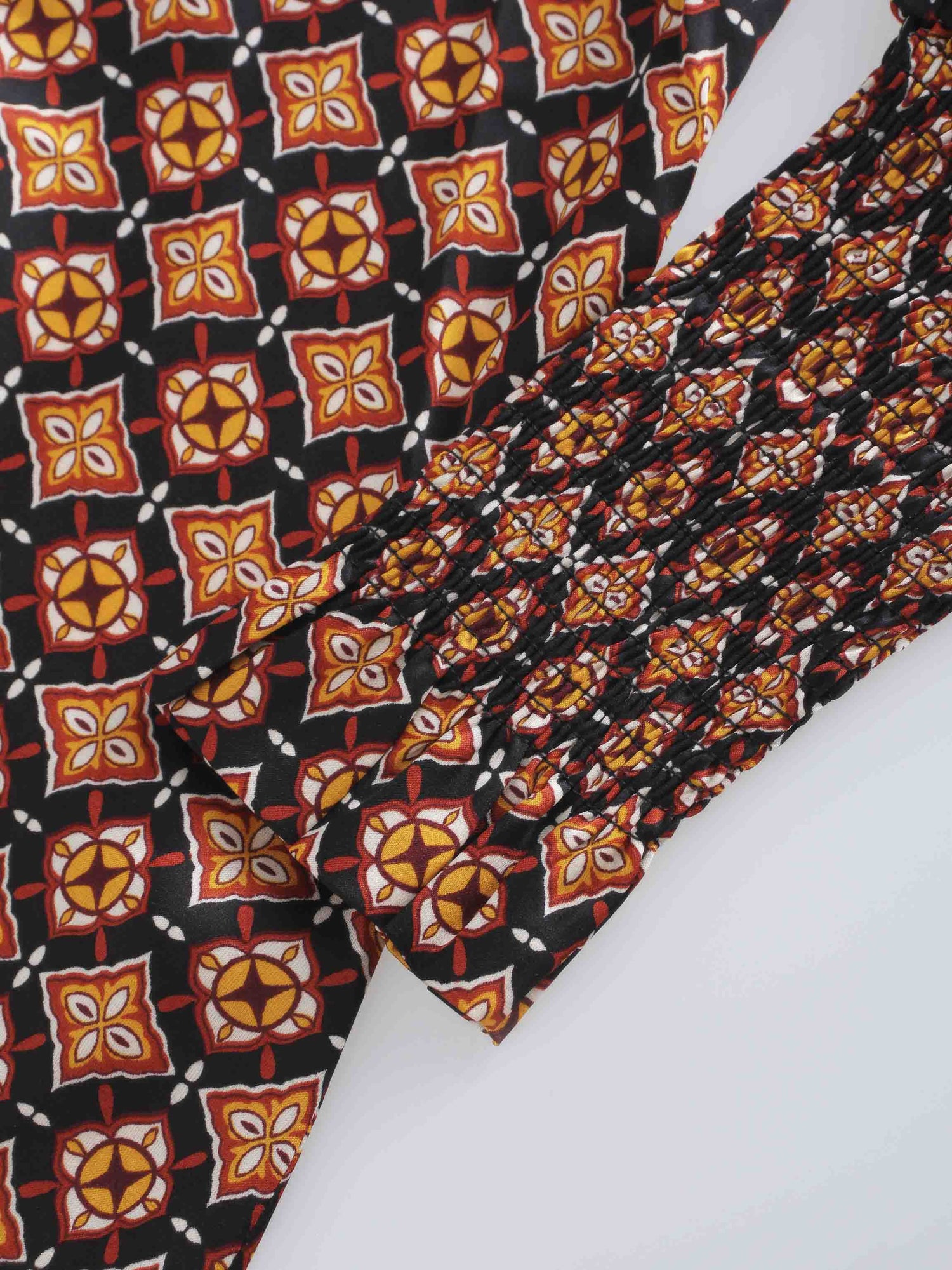 SMOCKED BLOUSE-GEOMETRIC MEDALLION BROWN