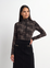 PRINTEDSTRETCH TEXTURED TURTLE NECK GREY AND BLACK PLAID